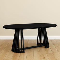 Contemporary black oval dining table with unique slatted base on wooden floor.