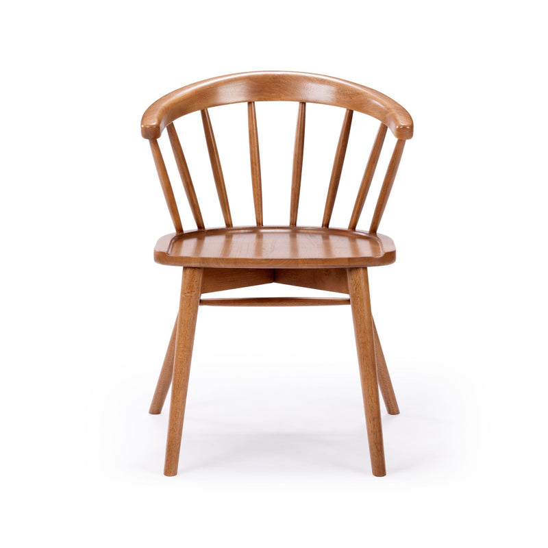 Wooden dining chair with curved backrest and spindle design on a white background.