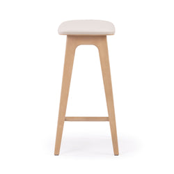 Minimalist natural wood counter-height bar stool with white upholstered seat, tapered legs and footrest for kitchen island