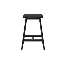 Backless black bar stool with padded seat and tapered legs, modern kitchen counter stool