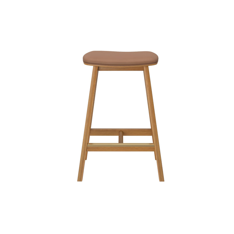 Mid-century modern backless wood bar stool with tan leather padded seat, natural oak tapered legs and footrest — ideal kitchen island or counter seating