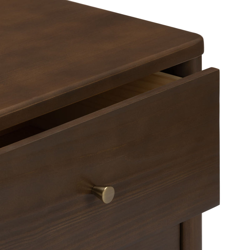 Close-up of brown wooden nightstand with partially open drawer and brass knob, modern bedroom dresser storage detail