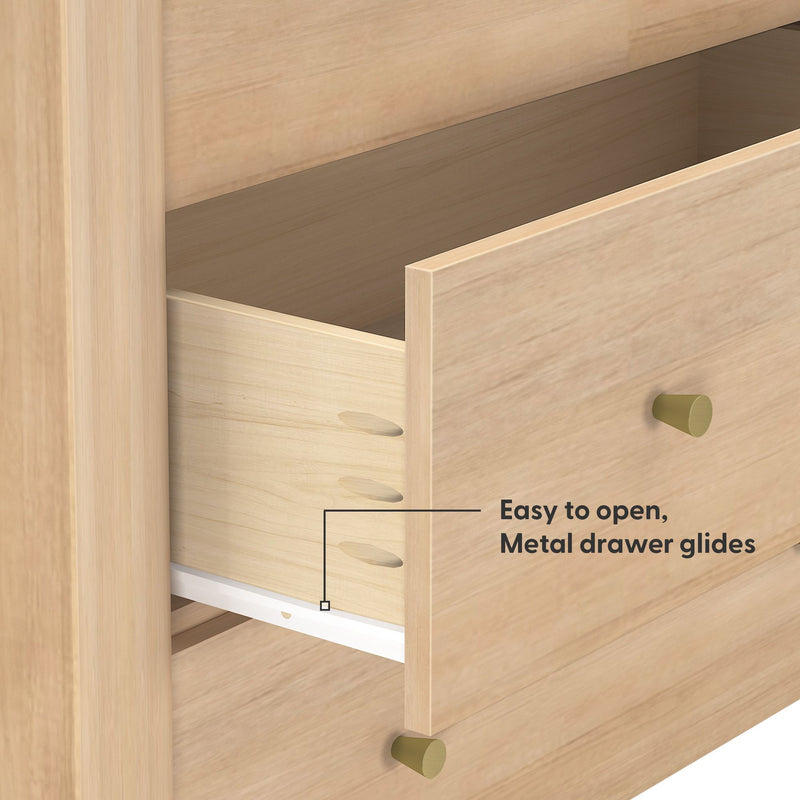 Close-up of light wood dresser drawer with easy-to-open metal drawer glides and brass knob, smooth sliding storage