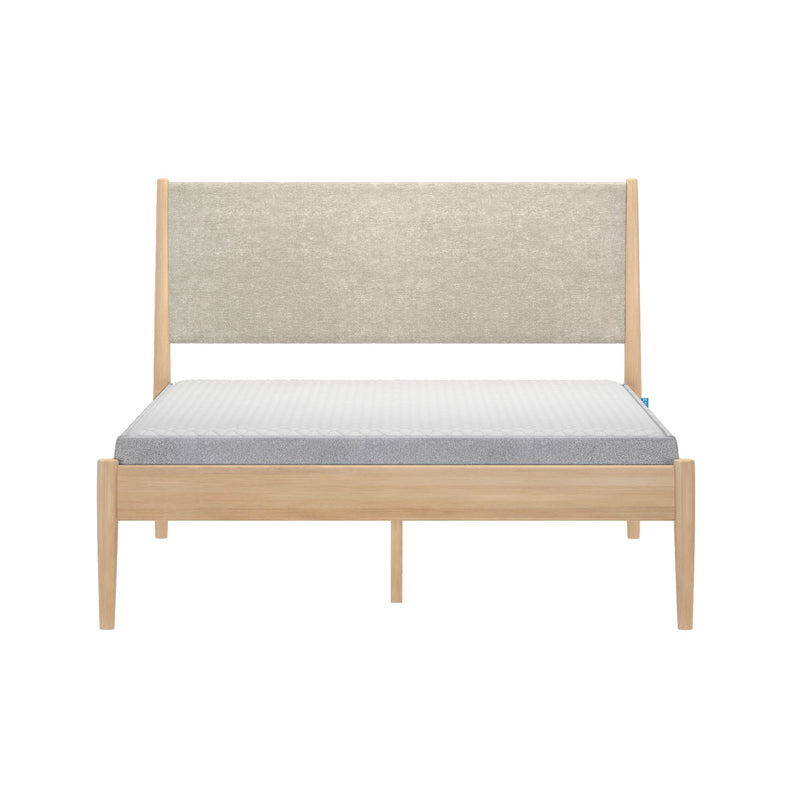 Light oak platform bed with beige upholstered headboard and white quilted mattress with gray side panels, modern minimalist Scandinavian bedroom furniture product image on white background