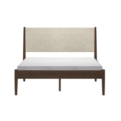 Front view of a mid-century modern walnut platform bed with beige linen upholstered headboard and white mattress on a plain white background