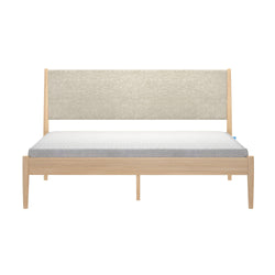 Minimalist wooden platform bed with beige upholstered headboard and grey mattress topper Scandinavian modern bedroom furniture