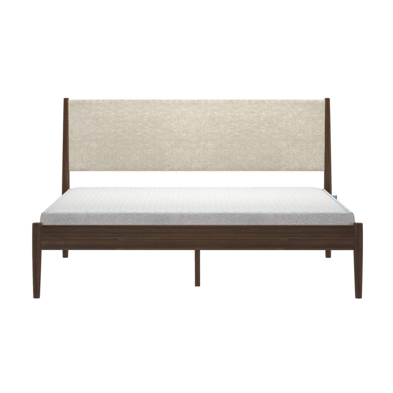 Mid-century modern walnut platform bed with beige upholstered headboard, white mattress and tapered wooden legs