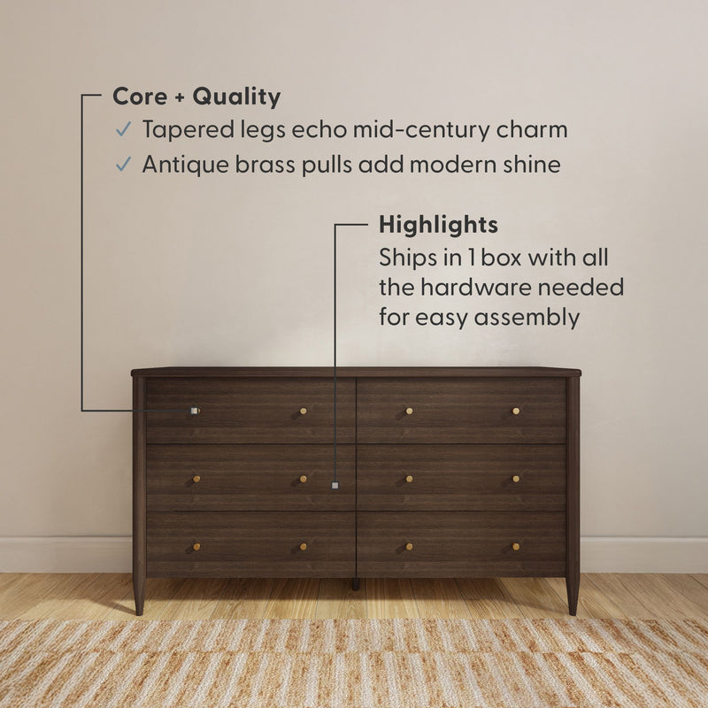 Mid-century modern walnut six-drawer dresser with tapered legs and antique brass pulls on hardwood floor and striped rug, ships in one box with hardware for easy assembly