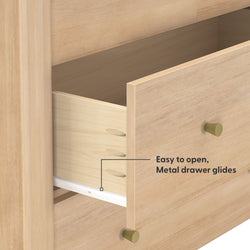 Open light oak dresser drawer showing metal drawer glides, pocket-hole joinery and brass knob detail