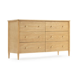 Mid-century modern 6-drawer wood dresser in light natural finish with brass knobs and tapered legs
