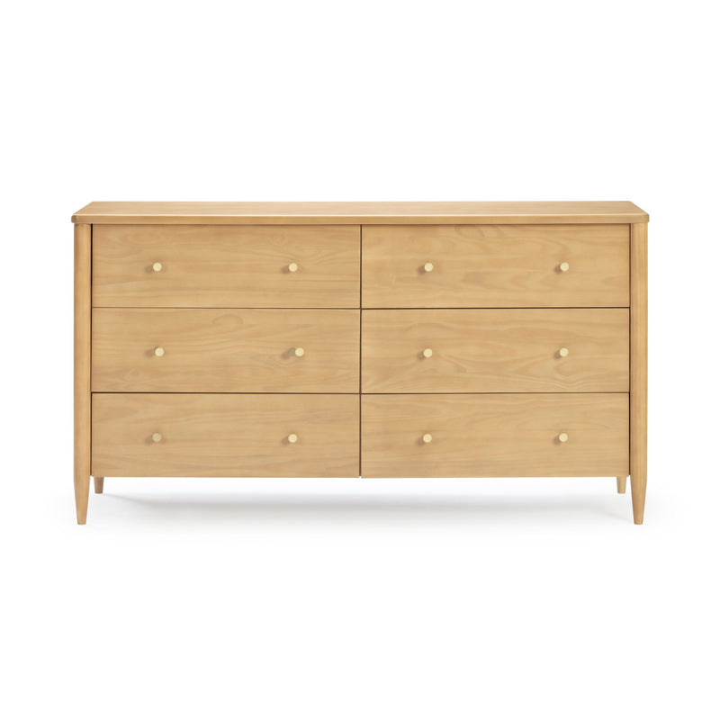 Mid-century modern 6-drawer light oak wooden dresser with brass knobs, tapered legs and natural wood grain bedroom storage