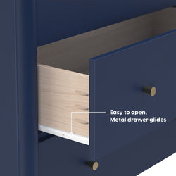 Navy blue dresser drawer with metal drawer glides, light wood interior and round brass knobs — easy-to-open storage solution