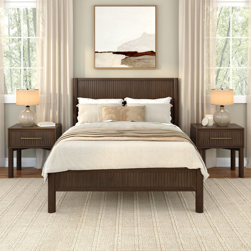 Neutral modern master bedroom with wooden bed frame, beige bedding, nightstands with lamps, abstract wall art and sheer curtains