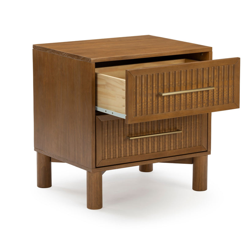Close-up of mid-century modern walnut wooden nightstand with fluted drawer fronts, brass bar handles, round legs and an open drawer