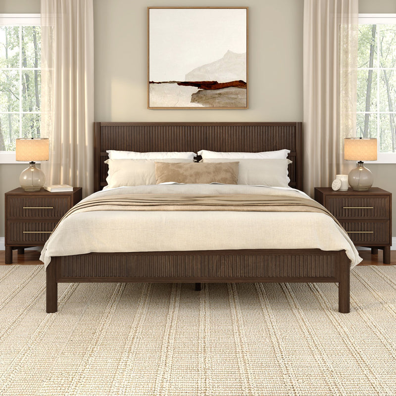 Modern neutral bedroom with dark wood bed frame, beige linen bedding, matching nightstands and lamps, large windows, minimalist wall art and textured jute rug
