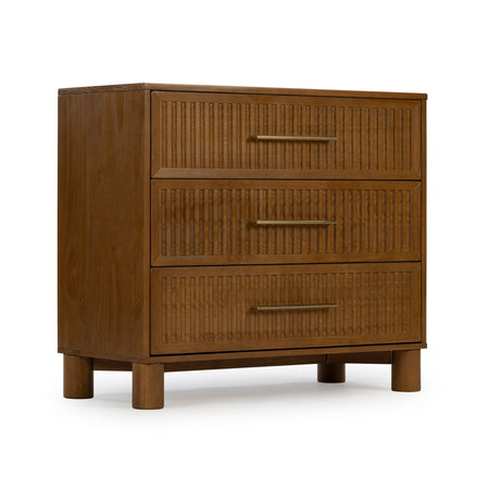 Mid-century modern three-drawer walnut dresser with ribbed drawer fronts, brass bar pulls and round wooden legs