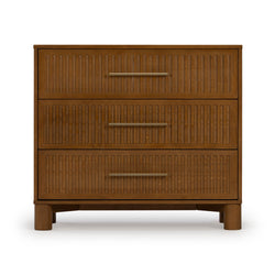 Walnut three-drawer dresser with fluted drawer fronts and brass bar handles, mid-century modern bedroom storage chest