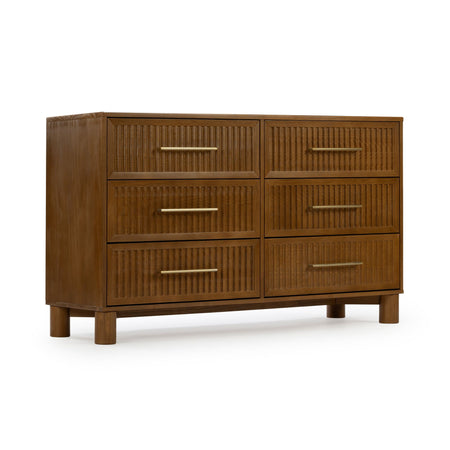 Mid-century modern walnut six-drawer dresser with ribbed drawer fronts and brass bar handles on short round legs, bedroom storage chest