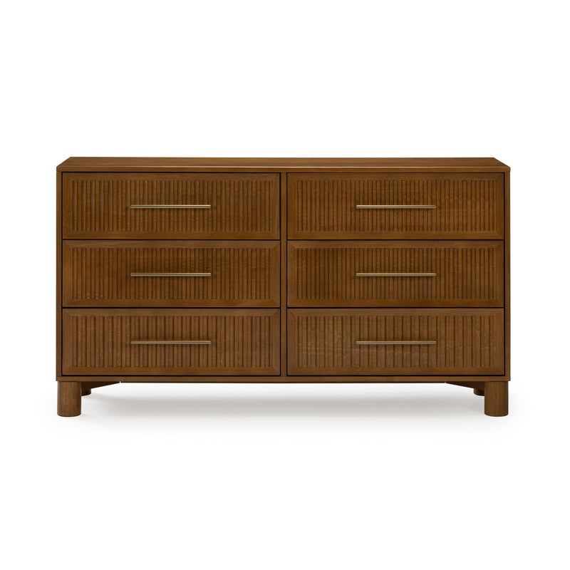 Walnut six-drawer dresser with fluted drawer fronts, brass bar pulls and round legs — mid-century modern bedroom storage