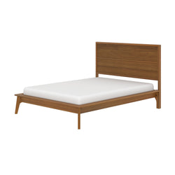 Mid-century modern wood platform bed with low-profile frame and horizontal slatted headboard in warm oak finish