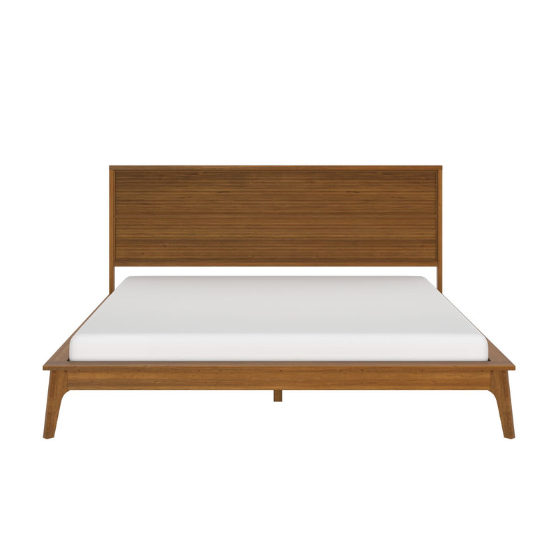 Mid-century modern wooden platform bed frame with slatted headboard, warm wood finish and angled legs, topped with white mattress, isolated on white background