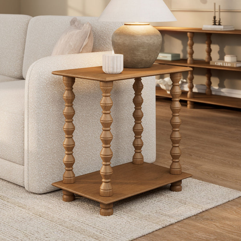 Neutral modern living room corner with beige boucle sofa, wooden spindle side table, ceramic table lamp and decorative candle