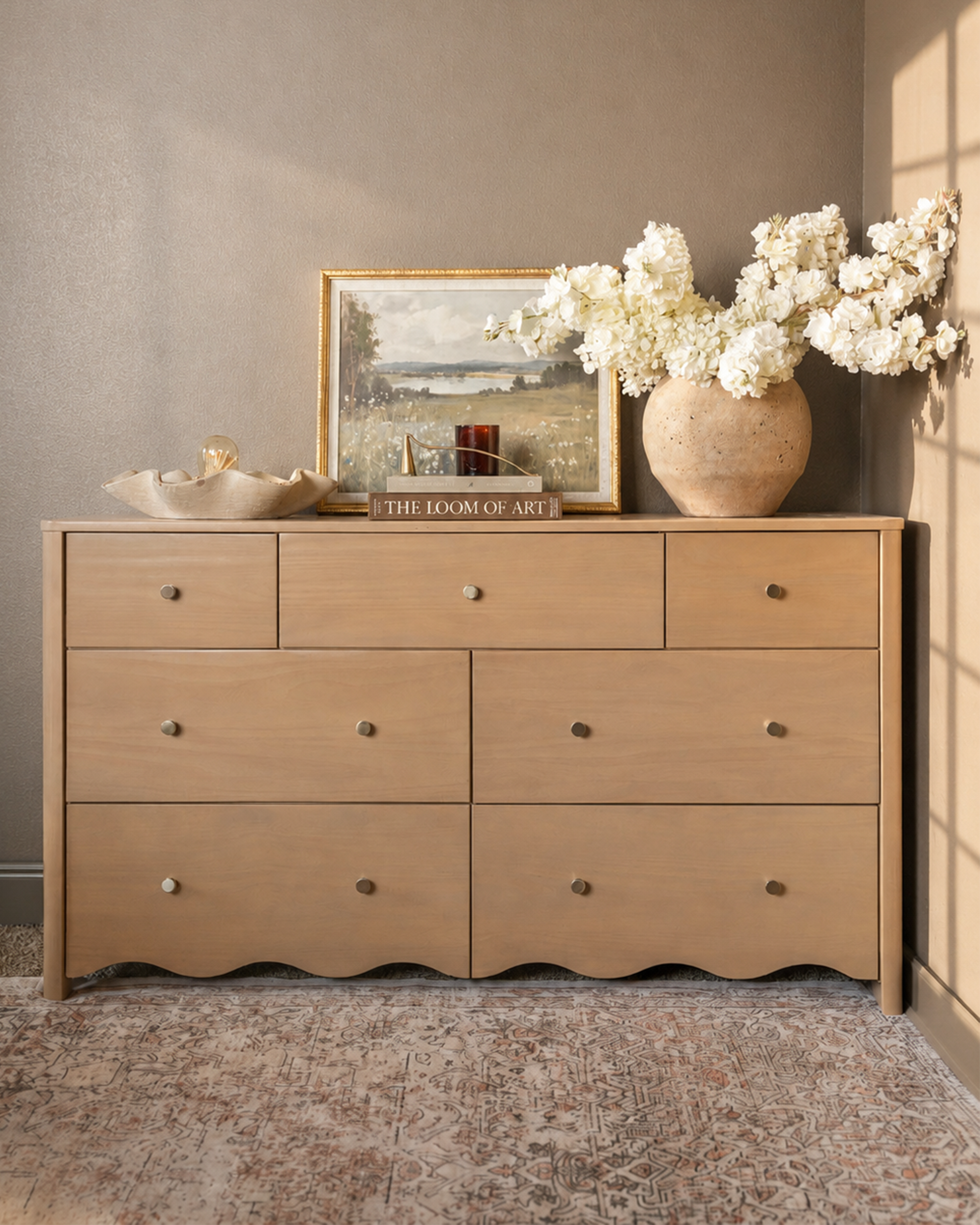 Scalloped, natural wood dresser.