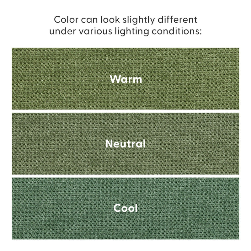 Close-up of three green upholstery fabric swatches labeled Warm, Neutral, Cool showing color shifts under different lighting conditions and woven texture.
