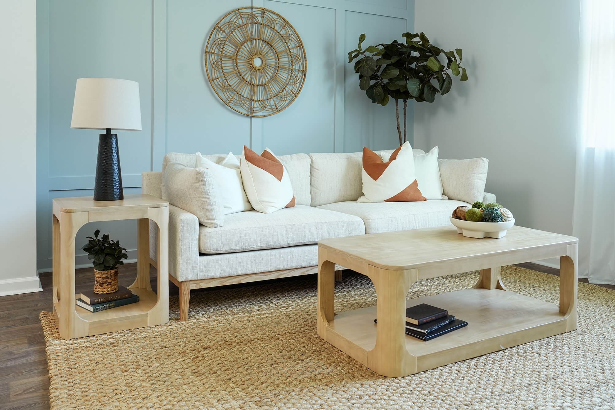Modern bedroom interior with stylish brown bed, beige linens, and decorative pillows in a cozy, well-lit space.