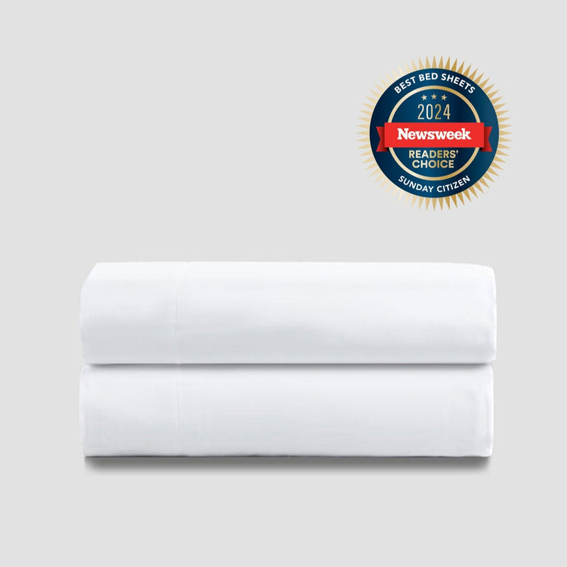 White bed sheets awarded Best Bed Sheets 2024 by Newsweek with Readers' Choice badge, premium quality bedding.