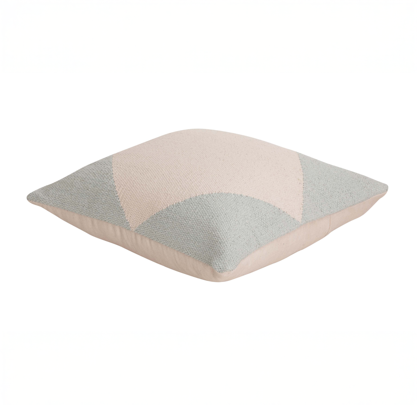 Decorative throw pillow with pastel geometric pattern for modern home decor.