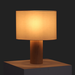 Contemporary wooden table lamp with a beige fabric lampshade emitting warm light, ideal for home decor.