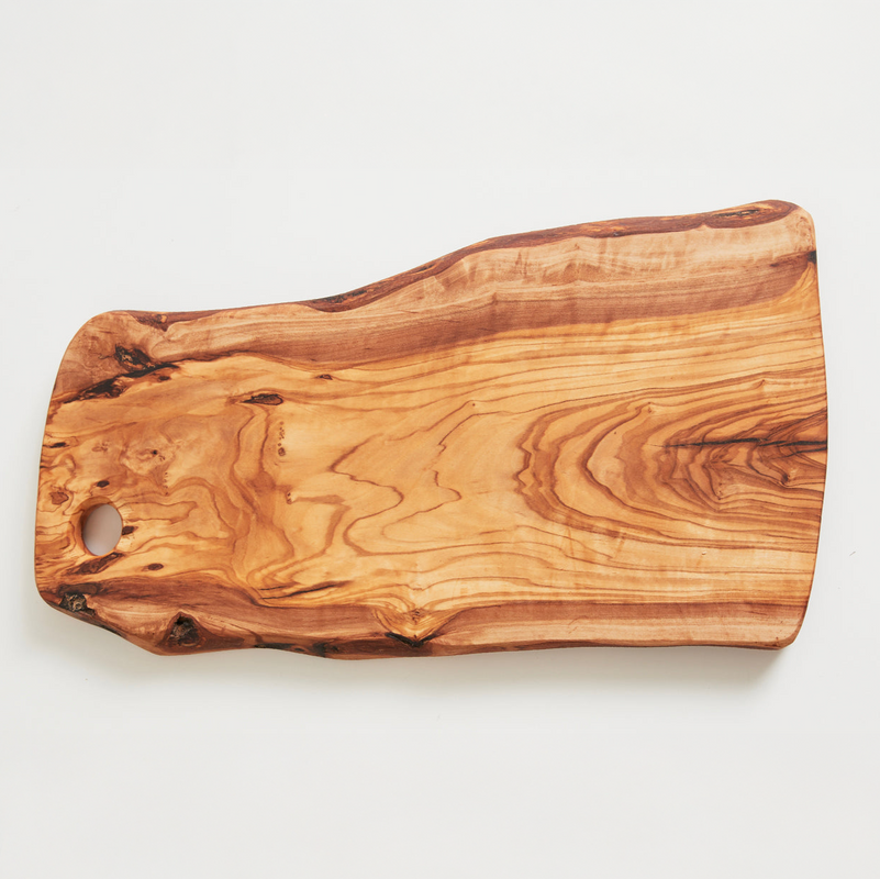 Handcrafted wooden cutting board with natural wood grain pattern.