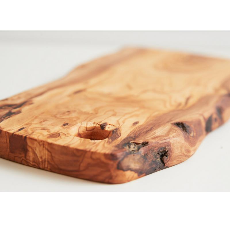 Rustic olive wood cutting board with natural grain and textured surface.