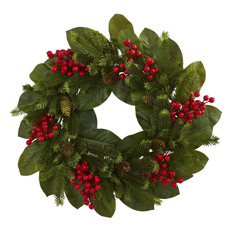 Decorative Christmas evergreen wreath with pine cones, red berries and lush green leaves on white background