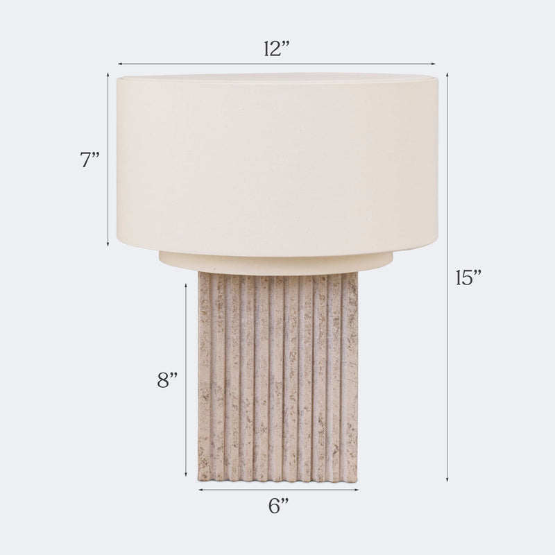 Modern fluted stone table lamp with cream drum shade, 15-inch height, 12-inch shade diameter, 8-inch ribbed base and 6-inch base width — neutral bedside or living room accent