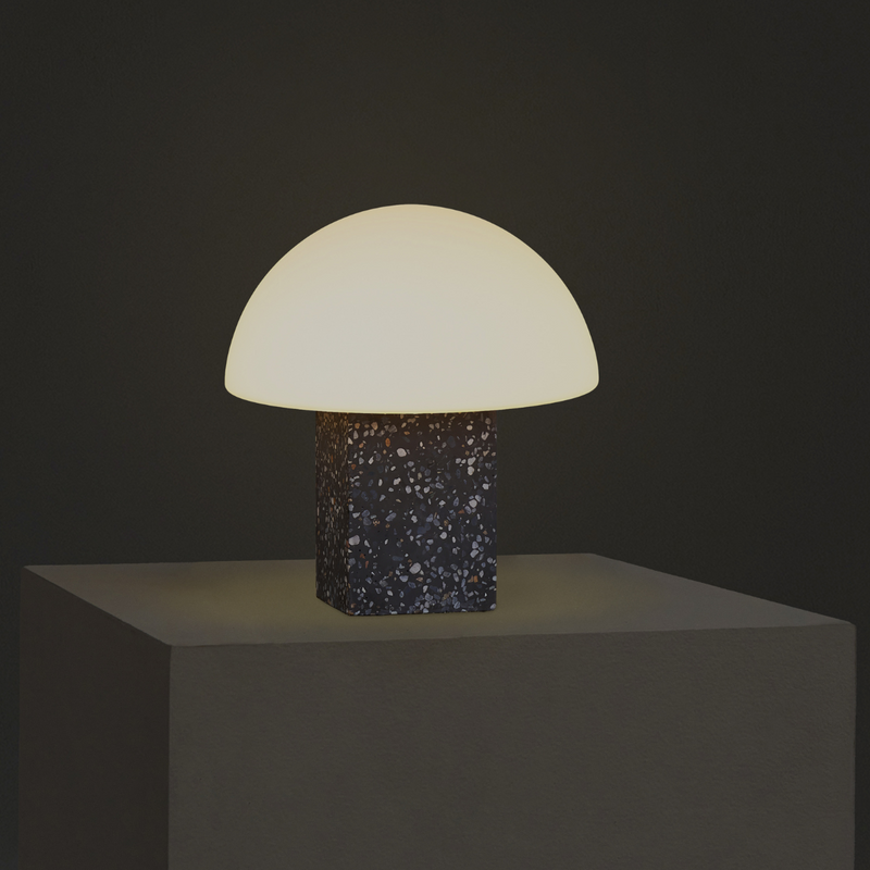 Modern mushroom table lamp with opal dome shade and terrazzo block base on pedestal, minimalist ambient bedside lighting