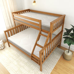 Wooden bunk bed with ladder and mattresses in a bright bedroom setting.