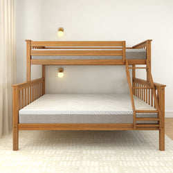 Wooden twin over full bunk bed with ladder in modern bedroom setting.