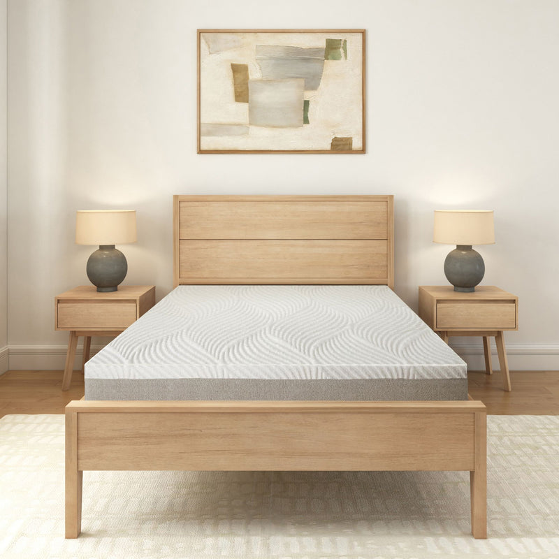 Modern minimalist bedroom with wooden bed frame, twin bedside tables and abstract artwork, featuring a comfortable mattress and neutral decor.