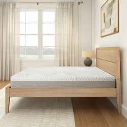Modern minimalist bedroom with wooden bed frame and comfortable mattress in bright natural lighting.
