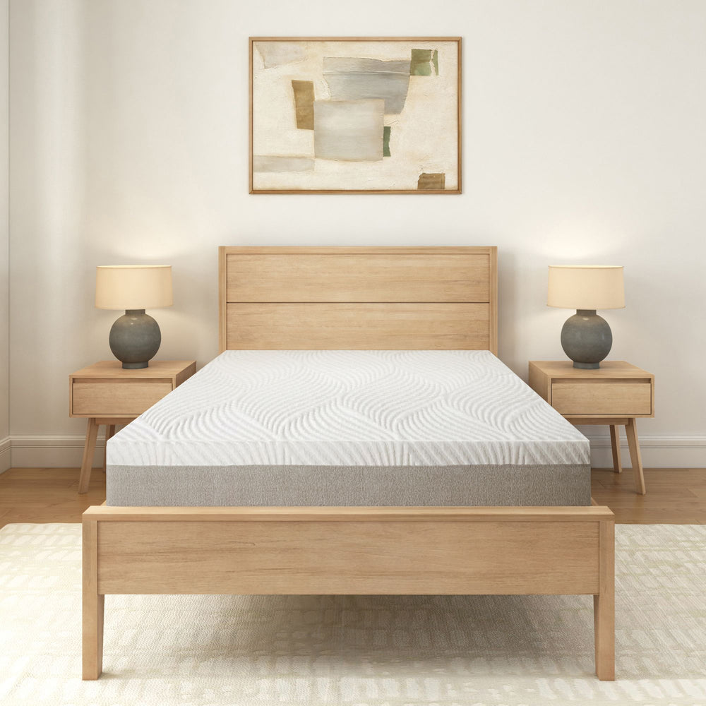 Modern minimalist bedroom with a wooden bed frame, comfortable mattress, and stylish bedside tables with lamps.