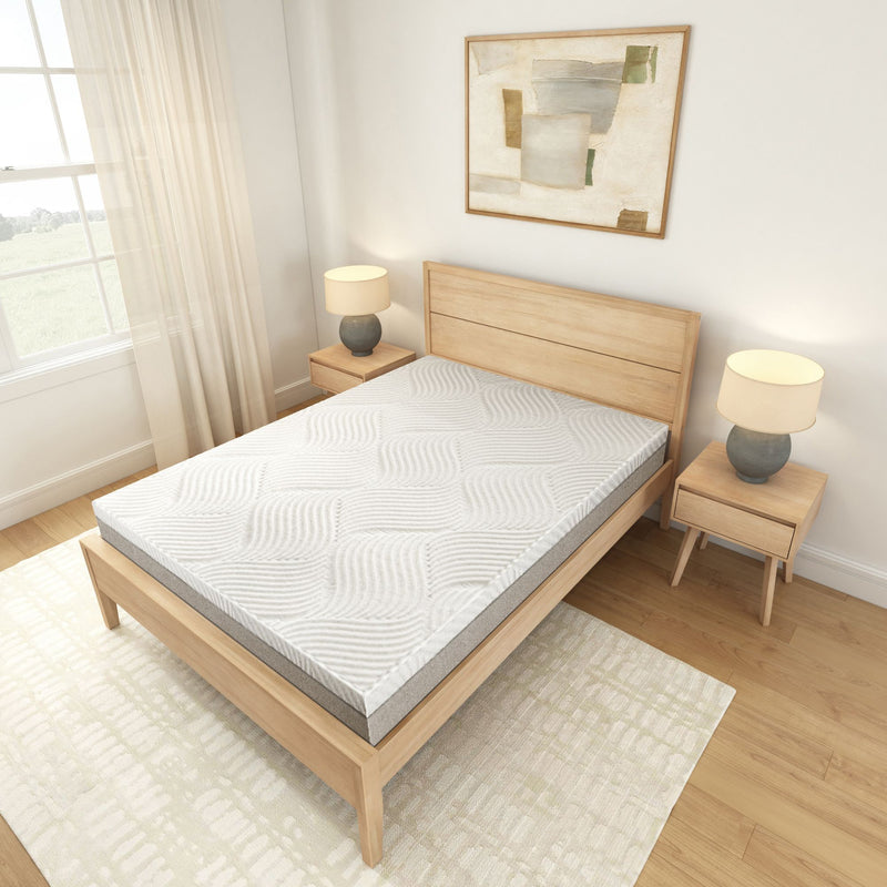 Modern minimalist bedroom with wooden bed frame, white mattress, and bedside tables with lamps.