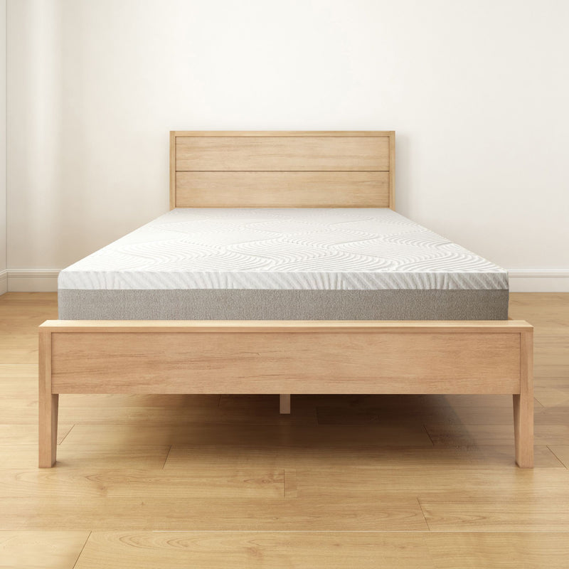 Wooden bed frame with headboard and mattress in modern bedroom setting.