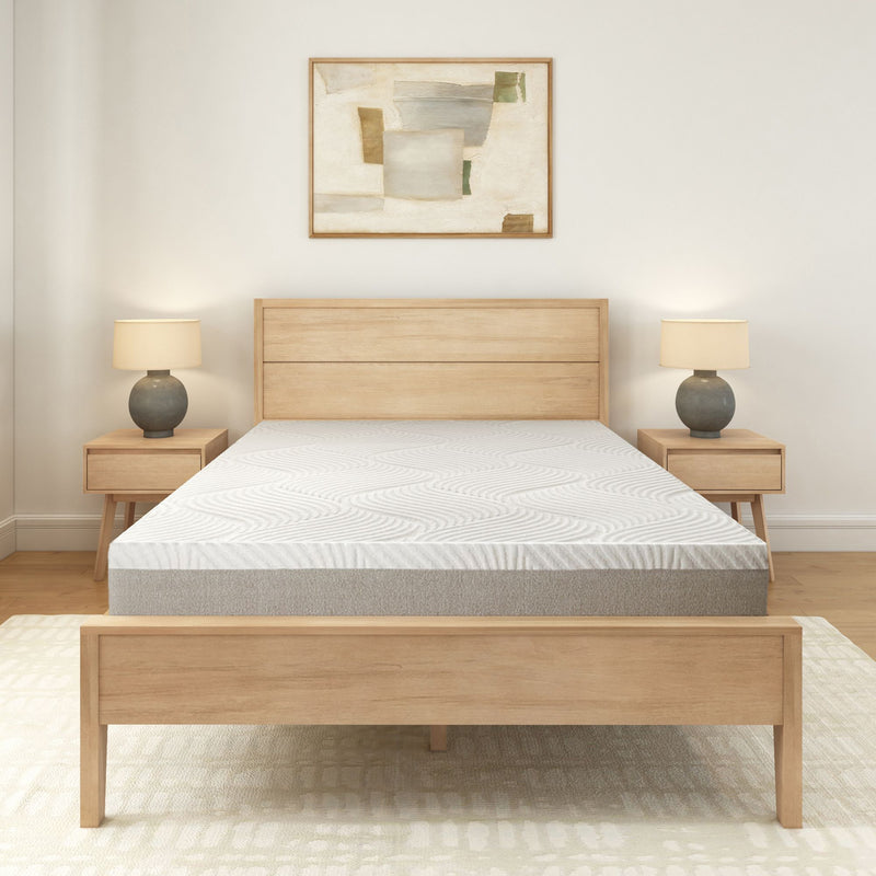 Modern minimalist bedroom with wooden bed frame, matching nightstands, decorative lamps, and abstract wall art.