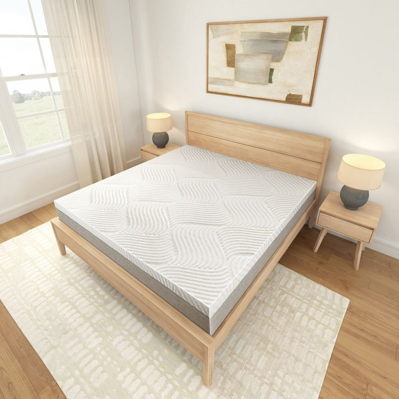 Modern bedroom with a comfortable wood frame bed and high-quality mattress.