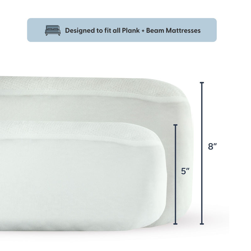 Two white Plank + Beam mattresses with dimensions labeled as 5 inches and 8 inches, designed to fit all Plank + Beam beds.