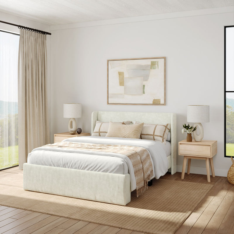 Modern bedroom interior with elegant queen-sized bed, neutral tones, abstract artwork, and large windows for natural light.