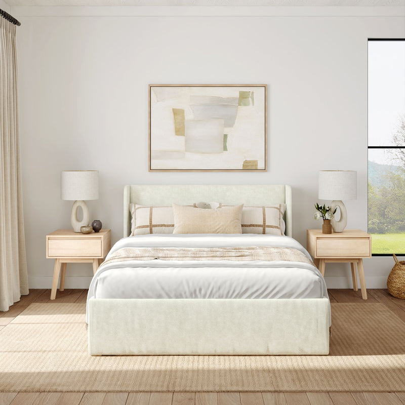 Modern minimalist bedroom with a cozy bed, abstract art, wooden nightstands, and table lamps.
