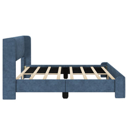 Blue upholstered platform bed frame with wooden slats.